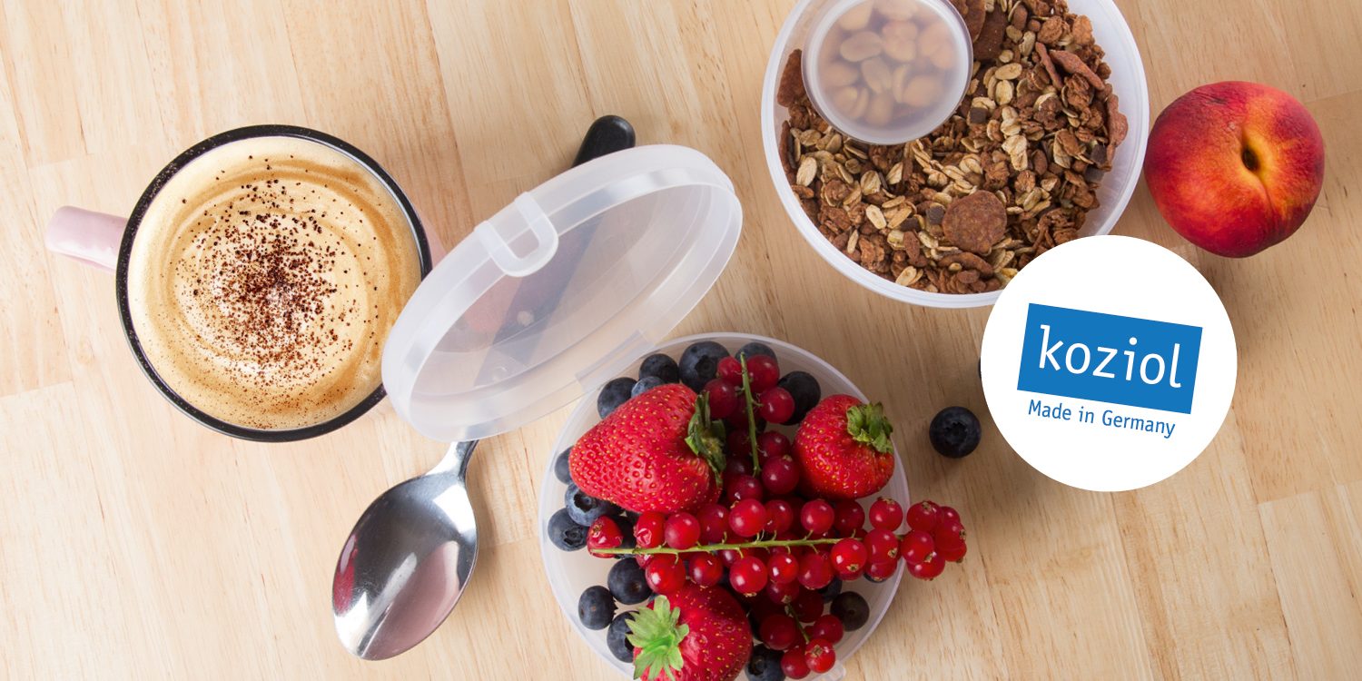 Transparente Lunchbox mit Ihrem Logo von Koziol – befüllt mit leckerem Frühstück
